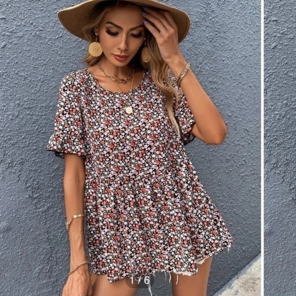 Ruffle hem floral blouse.